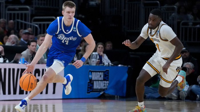 Drake Bulldogs guard Bennett Stirtz (14) dribbles against Missouri Tigers guard Marques Warrick (1) in the first half of a first round men’s NCAA Tournament game at Intrust Bank Arena.