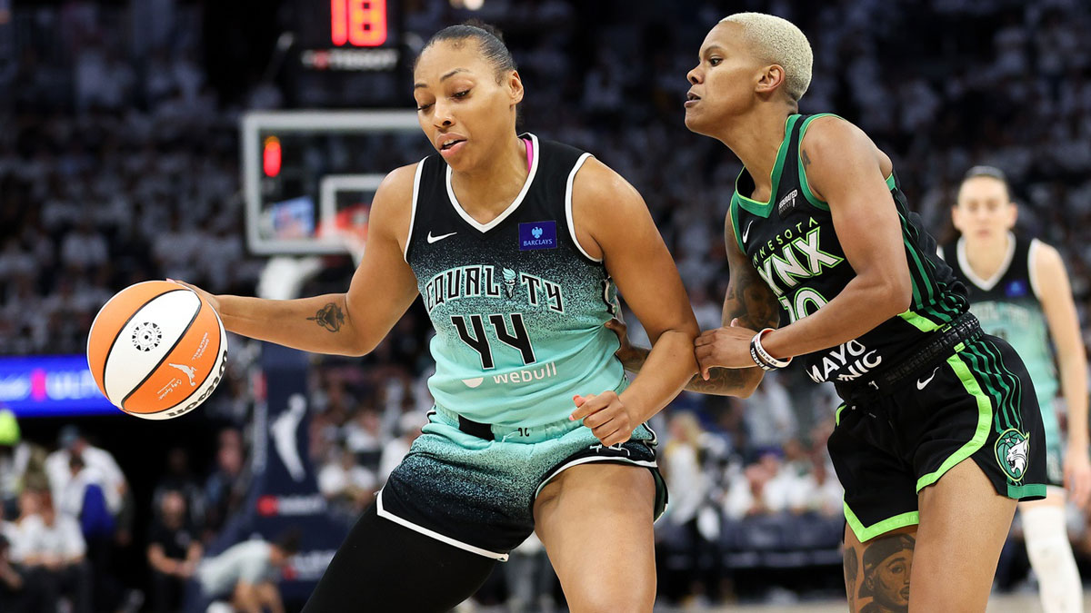 New York Liberty forward Betnijah Laney-Hamilton (44) drives past Minnesota Lynx guard Courtney Williams (10) during the second half of game four of the 2024 WNBA Finals at Target Center.