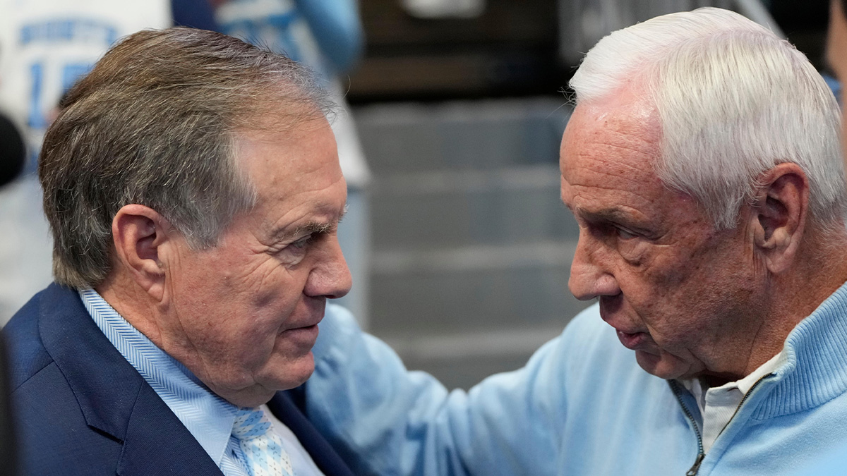 North Carolina Tar Heels head football coach Bill Belichick with former Tar Heels basketball coach Roy Williams before the game at Dean E. Smith Center. Mandatory Credit: Bob Donnan-Imagn Images