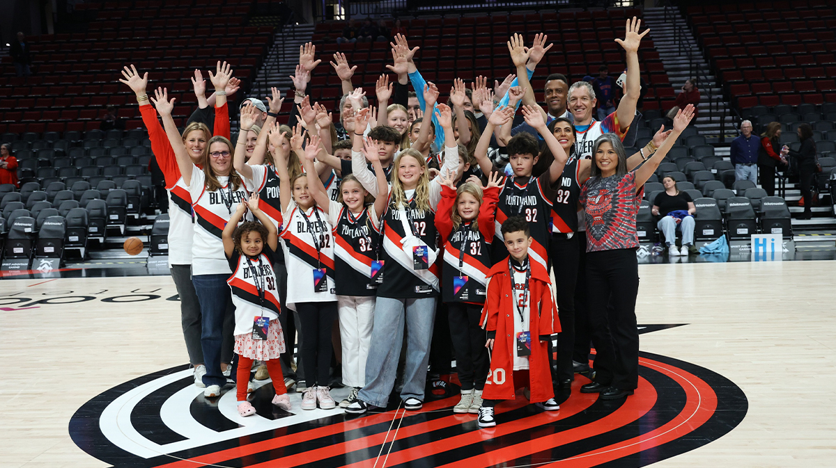 Family and friends of former Portland Trail Blazers’ Bill Walton pose for a picture before Walton is recognized during the game between Trail Blazers and the Detroit Pistons at Moda Center. 