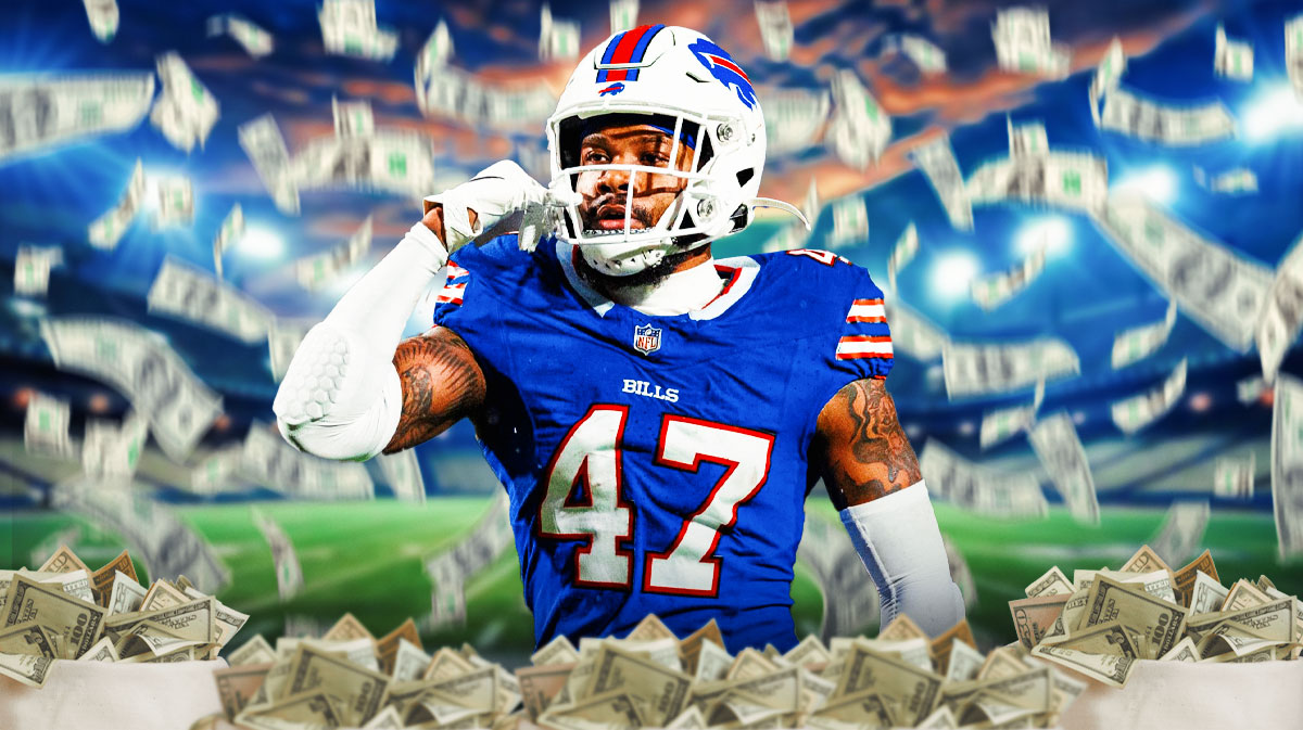 Christian Benford with a bunch of money falling around him
