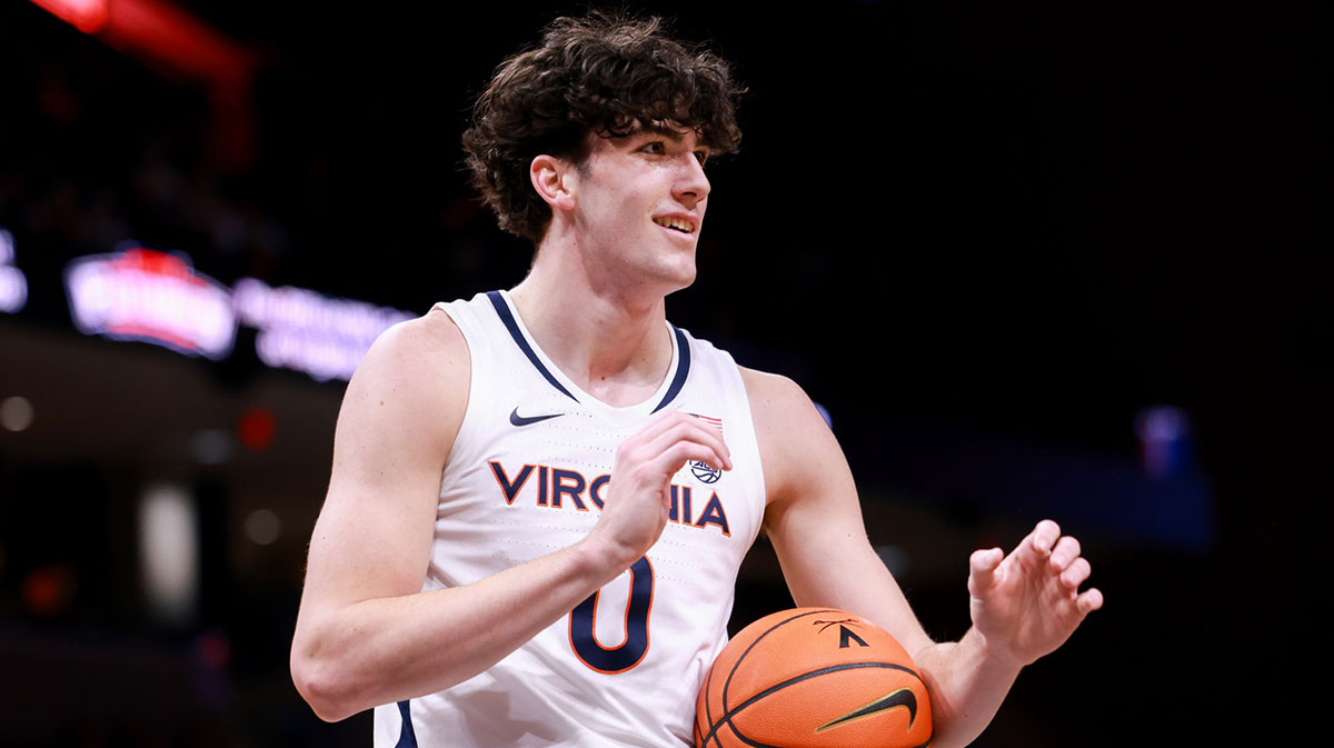 Virginia Cavaliers forward Blake Buchanan (0) talks to the coaching staff in the second half against the Florida State Seminoles at John Paul Jones Arena.