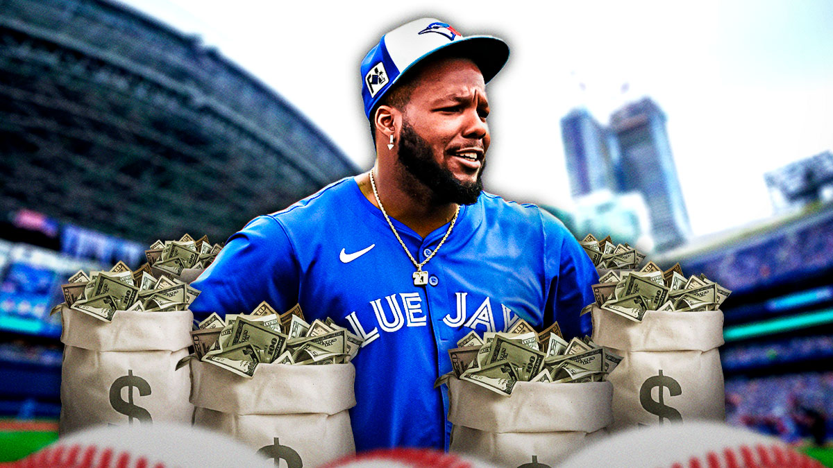 Blue Jays Vladimir Guerrero Jr with money bags around him and he's smiling.
