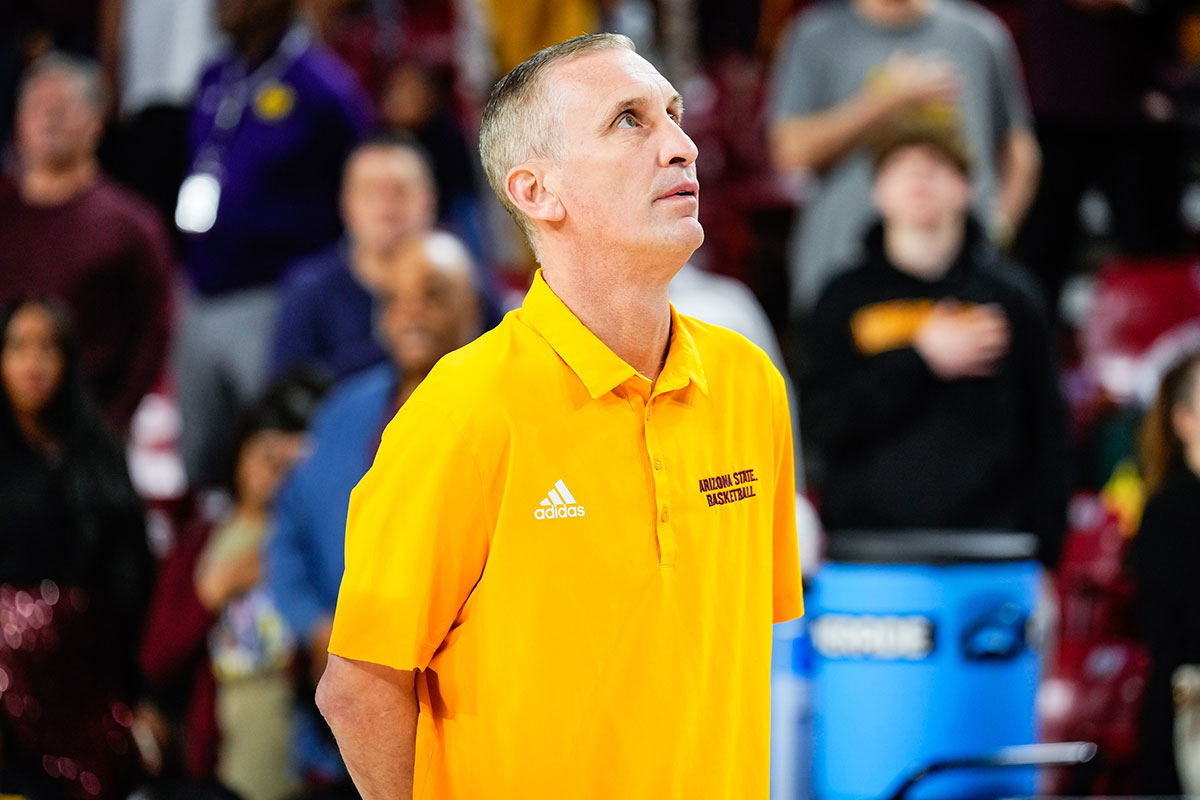 Arizona State Sun Devils head coach Bobby Hurley during the national anthem before a game against the Texas Tech Red Raiders at Desert Financial Arena.