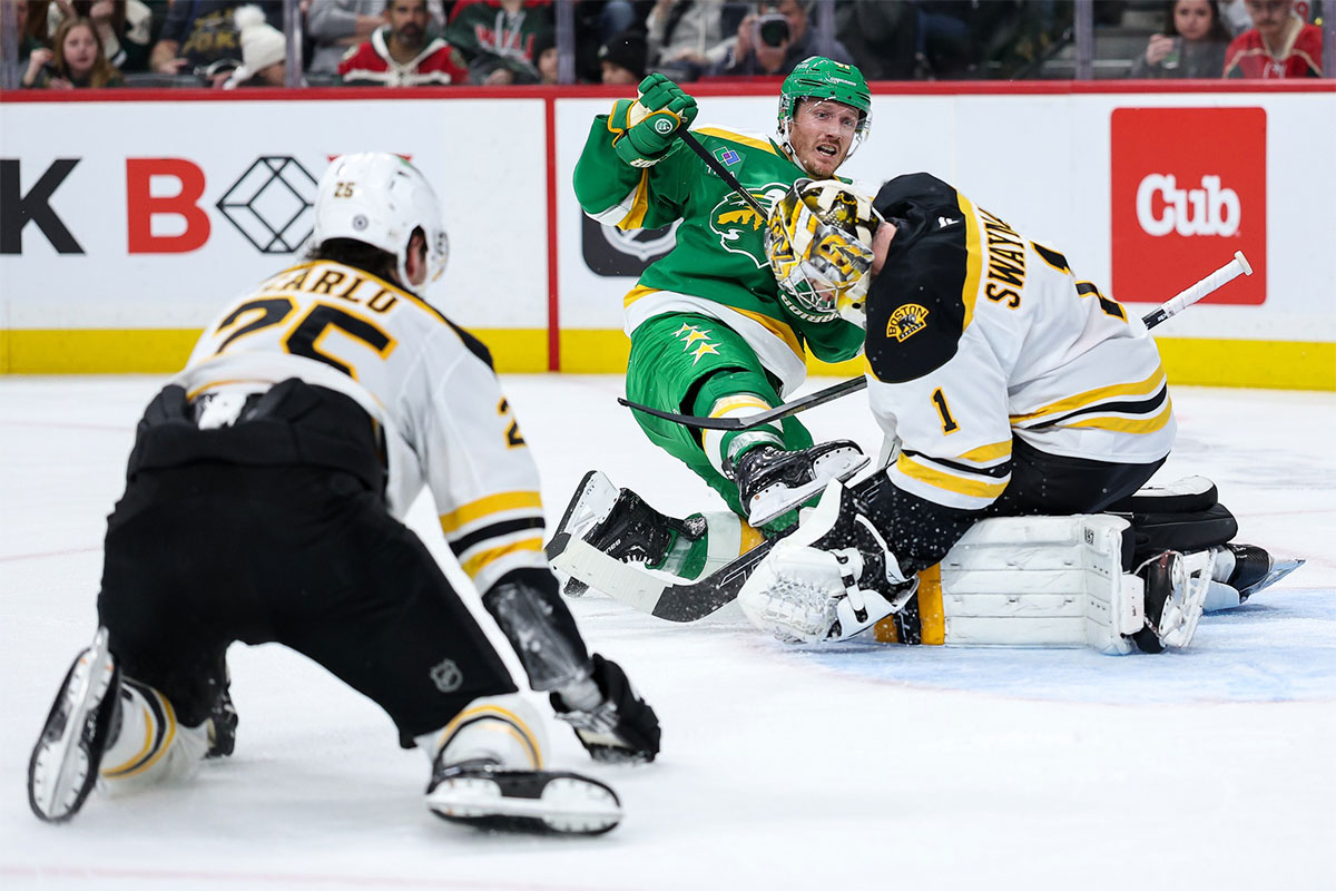 Boston Bruins goaltender Jeremy Swayman (1) makes a save on a shot by Minnesota Wild center Gustav Nyquist (41) during the second period at Xcel Energy Center.