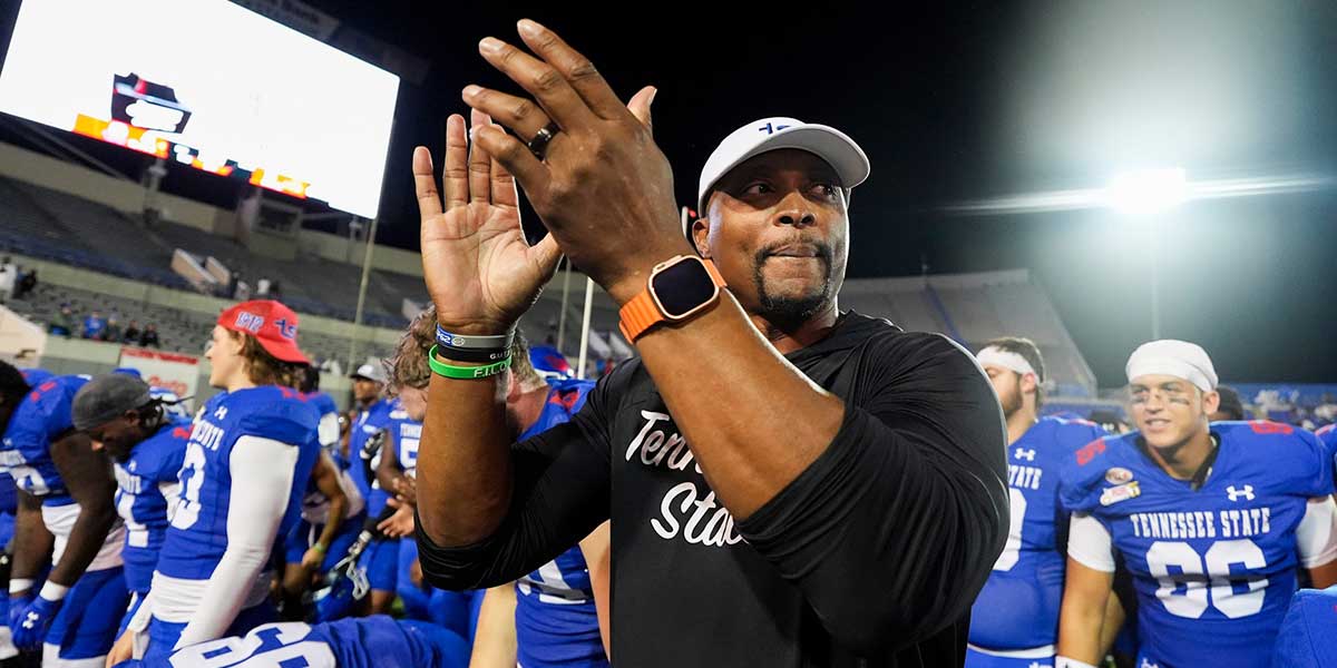 Tennessee State's head coach Eddie George claps after he and his players listened to the band play after they defeated UAPB 41-28 in the Southern Heritage Classic in Memphis, Tenn., on Saturday, September 14, 2024.