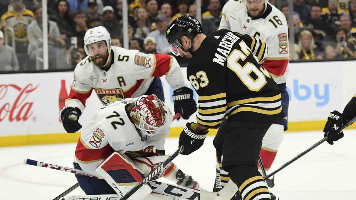 Florida Panthers goaltender Sergei Bobrovsky (72) makes a save in front of Boston Bruins left wing Brad Marchand (63) during the first period in game six of the second round of the 2024 Stanley Cup Playoffs at TD Garden.