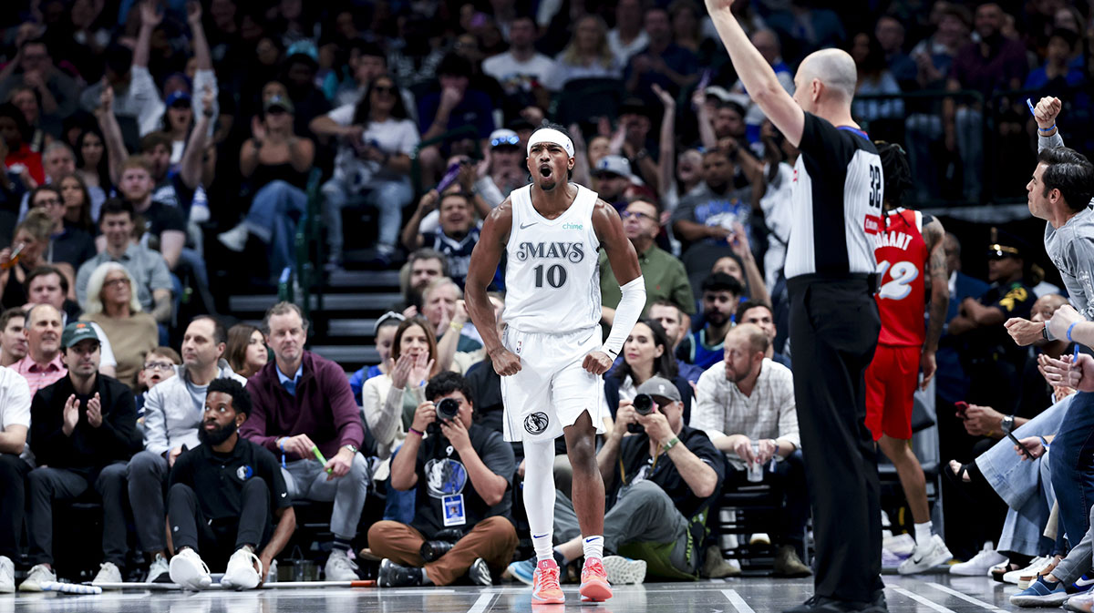 Dallas Mavericks guard Brandon Williams (10) reacts after scoring against the Memphis Grizzlies during the first half at American Airlines Center.