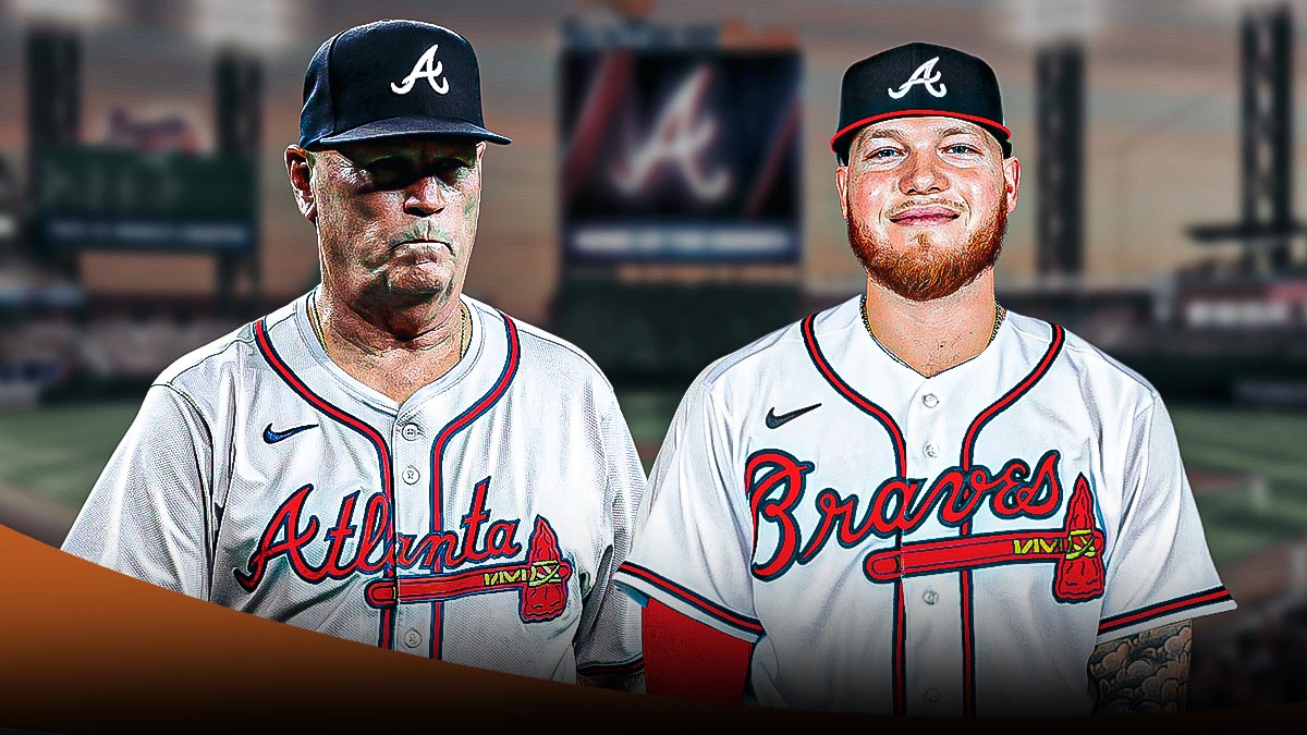 Atlanta Braves manager Brian Snitker with Alex Verdugo in a Braves uniform as the braves signed free agent alex verdugo to add outfield depth through free agency.