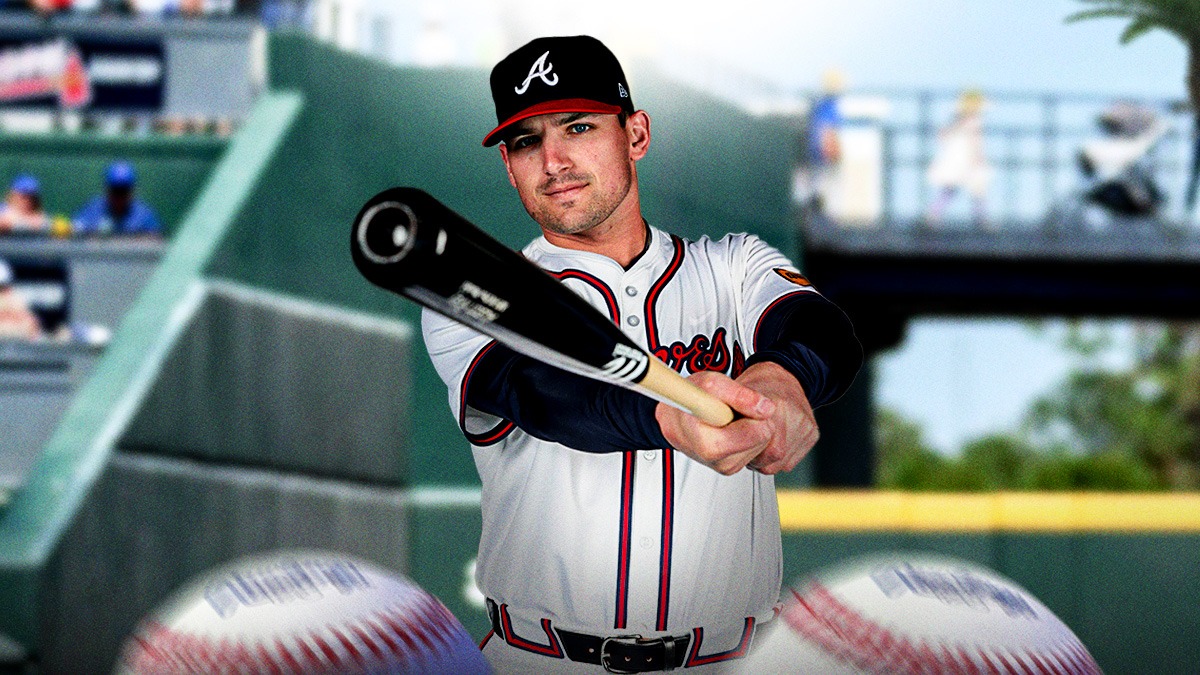 Braves' Austin Riley with a bat in his hand, CoolToday Park behind him