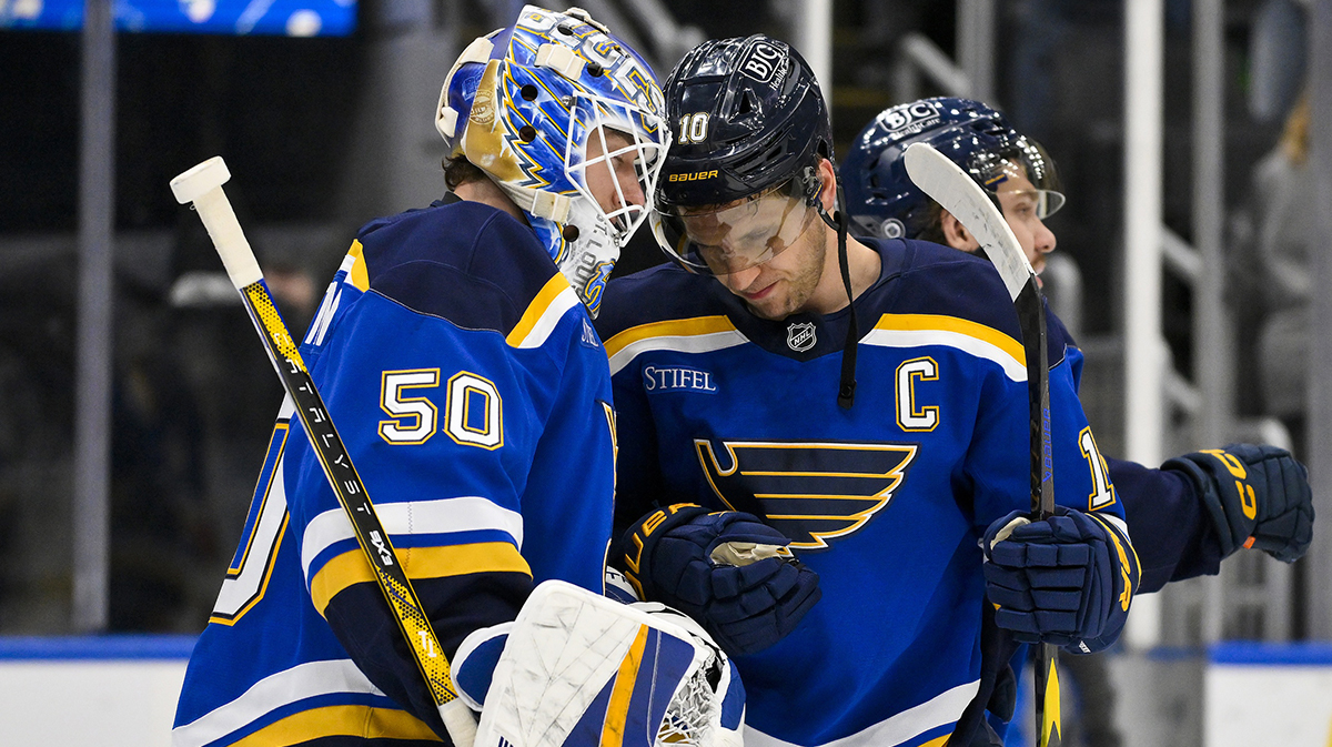 St. Louis Blues goaltender Jordan Binnington (50) celebrates with center Brayden Schenn (10) after the Blues defeated the Anaheim Ducks at Enterprise Center.