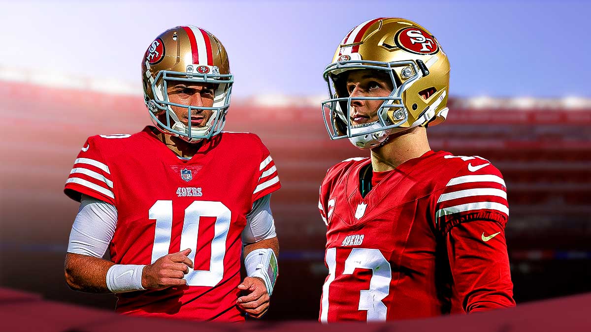 49ers Brock Purdy (front) with 49ers Jimmy Garoppolo (back) behind him