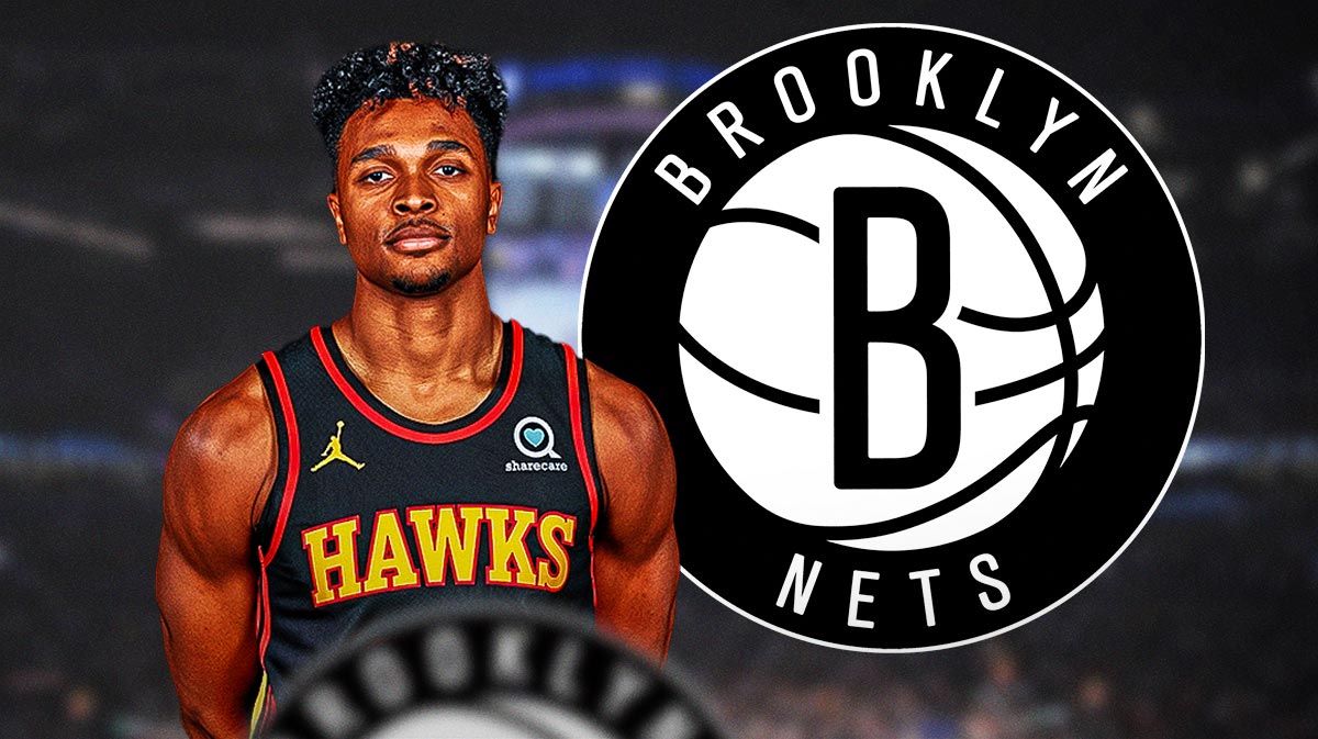 Tyson Etienne with a Nets logo next to him
