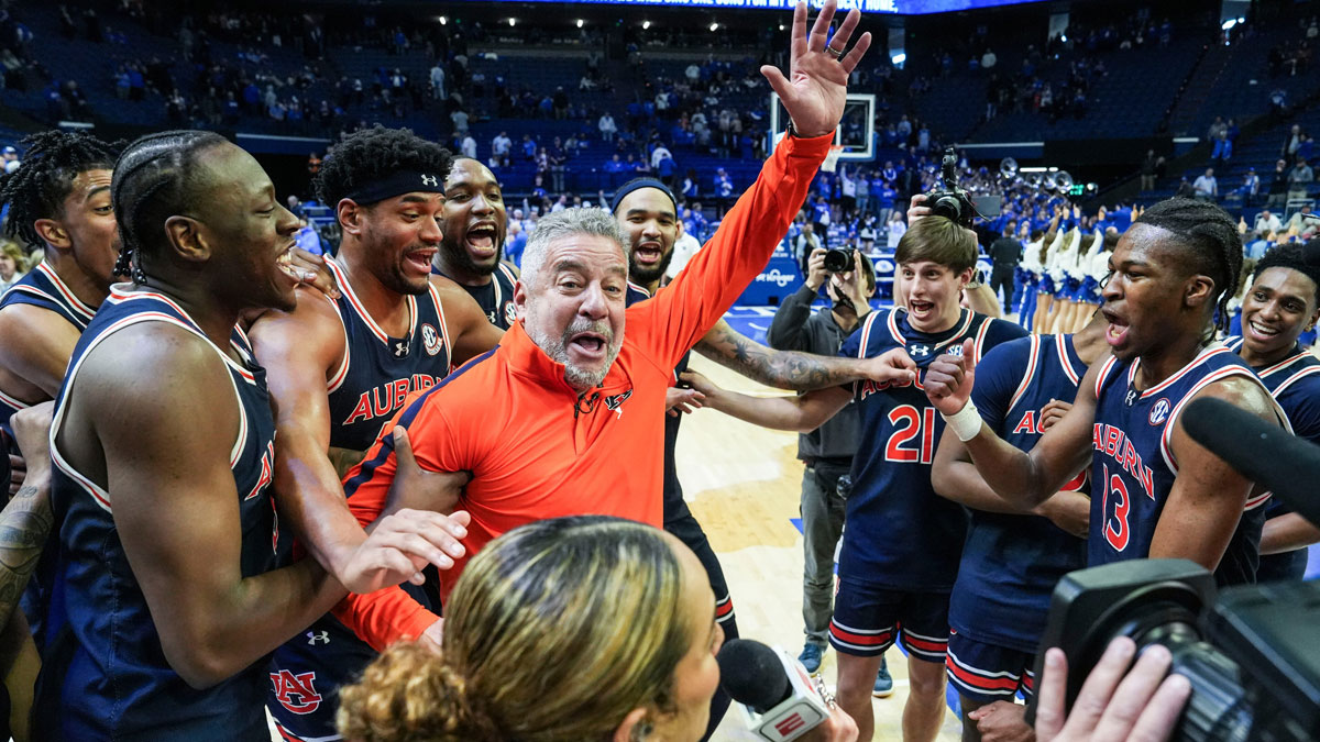 Auburn head coach Bruce Pearl and his No.1 Tigers celebrate after 94-78 win over Kentucky -- the first win at Rupp Arena since 1988 in SEC basketball Saturday afternoon in Lexington, Kentucky March 1, 2025.