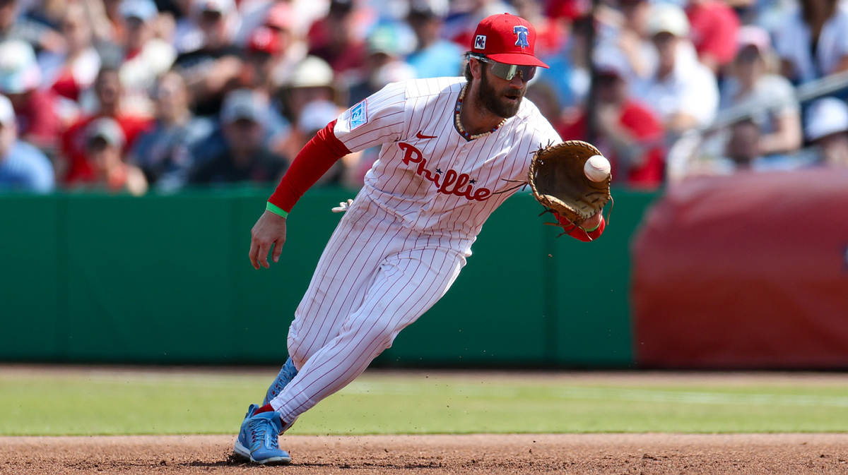 Philadelphia Phillies The first Baseman Brice Harper (3) fields the ball against Baltimore Orioles in the fifth Inning during spring training in Baicare Ballpark.