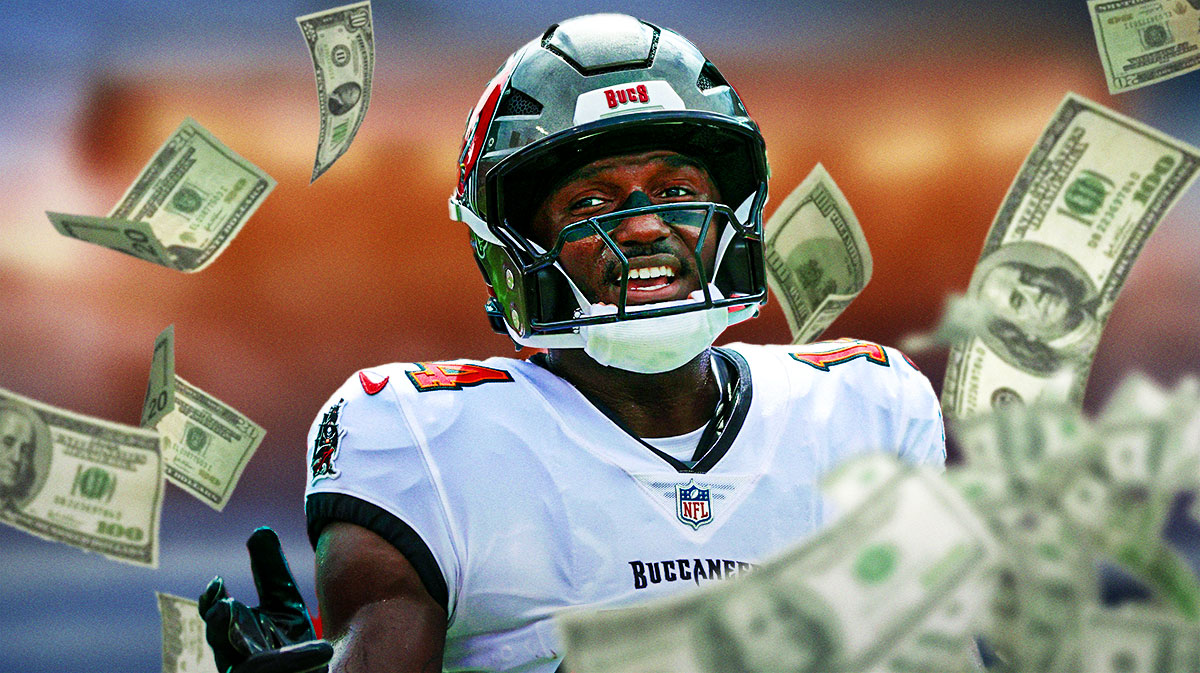 Chris Godwin with money floating around the picture.