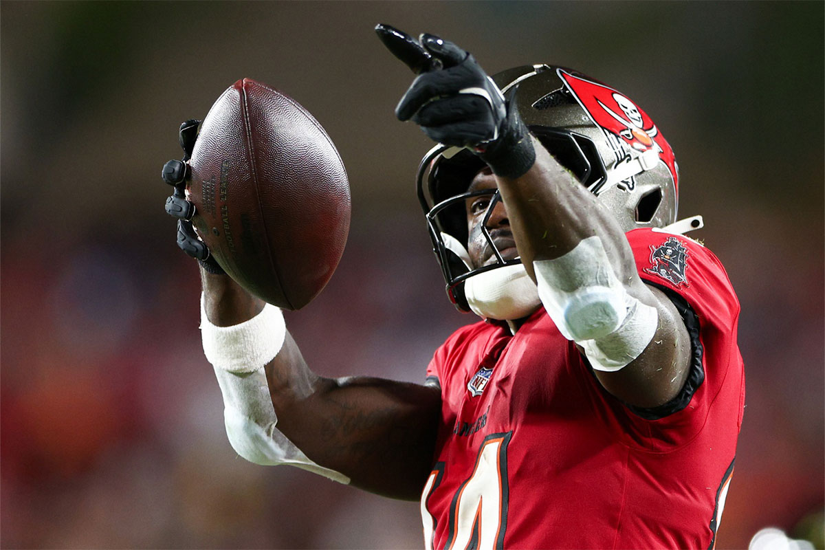 Tampa Bay Buccaneers wide receiver Chris Godwin (14) celebrates a first down against the Baltimore Ravens in the second quarter at Raymond James Stadium.