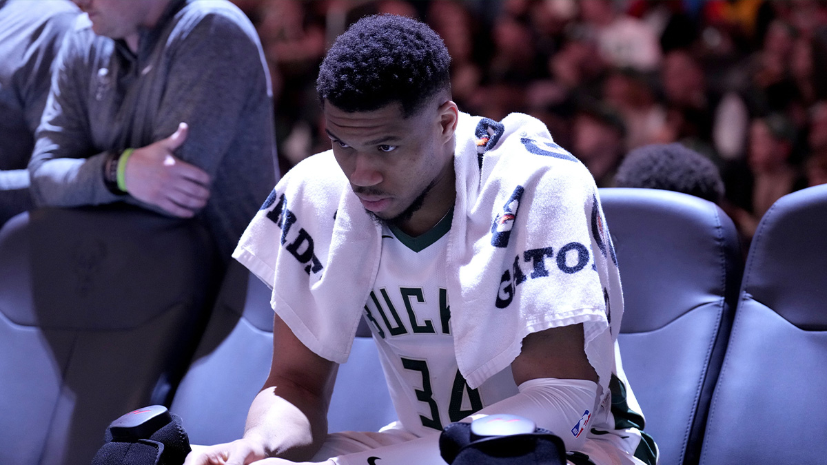 Milwaukee Bucks forward Giannis Antetokounmpo (34) sits on the bench during a time out against the Orlando Magic in the second half at Fiserv Forum. 