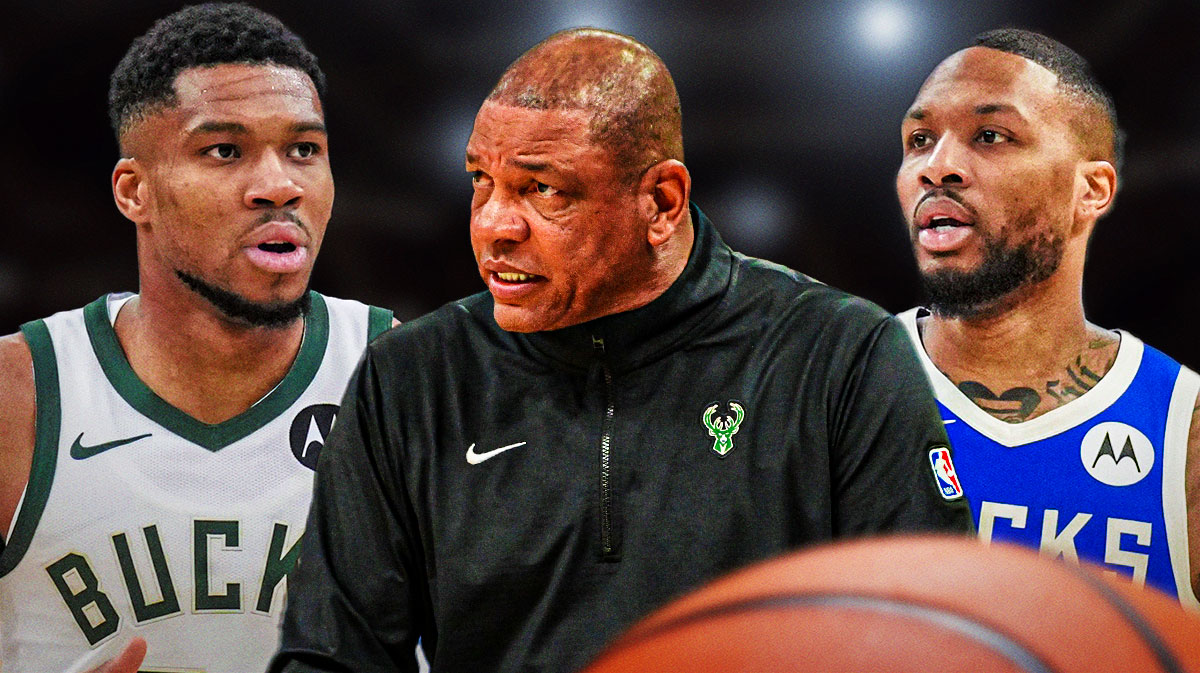 Bucks' Giannis on left, facing toward the left. Doc in the middle, facing forward. Dame on the right, facing right.