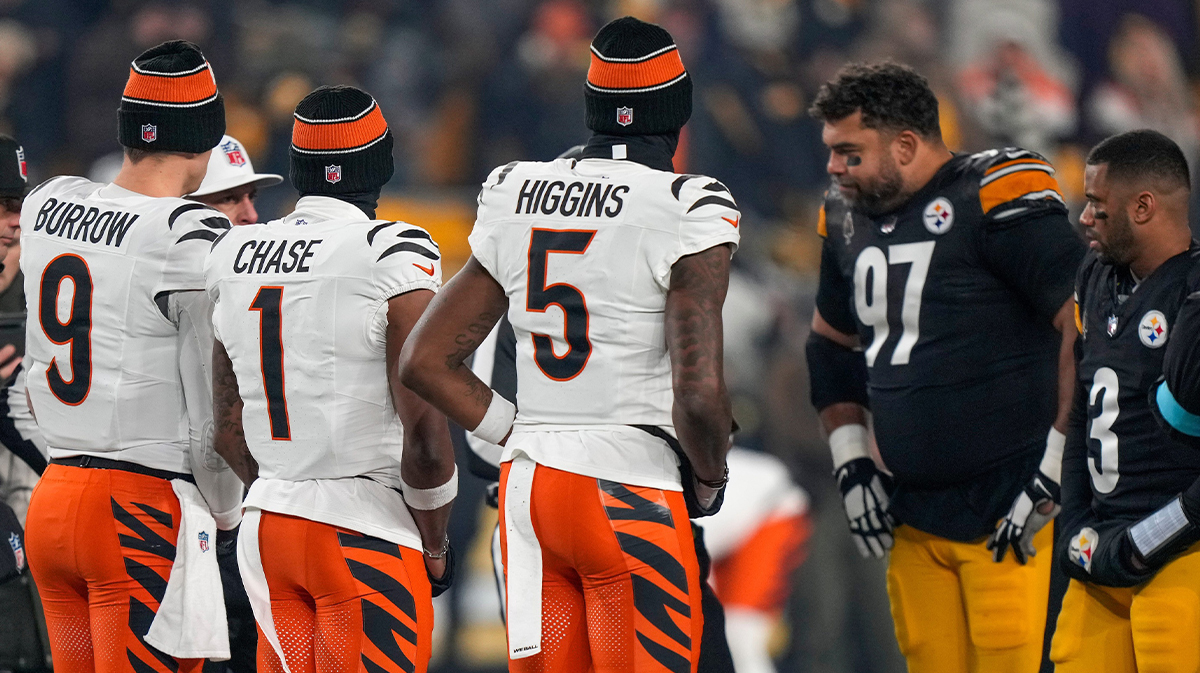 Cincinnati Bengals wide receiver Ja'Marr Chase (1), quarterback Joe Burrow (9) and wide receiver Tee Higgins (5) take the field as captains for the coin toss before the first quarter of the NFL Week 18 game between the Pittsburgh Steelers and the Cincinnati Bengals at Acrisure Stadium in Pittsburgh on Saturday, Jan. 4, 2025.