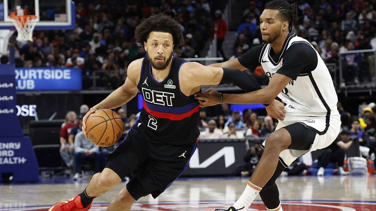 Detroit Pistons Guard Cade Cunningham (2) Dribbles Brooklyn Nets Forward Ziaire Williams (8) In the second half of the Arena Little Caesars.