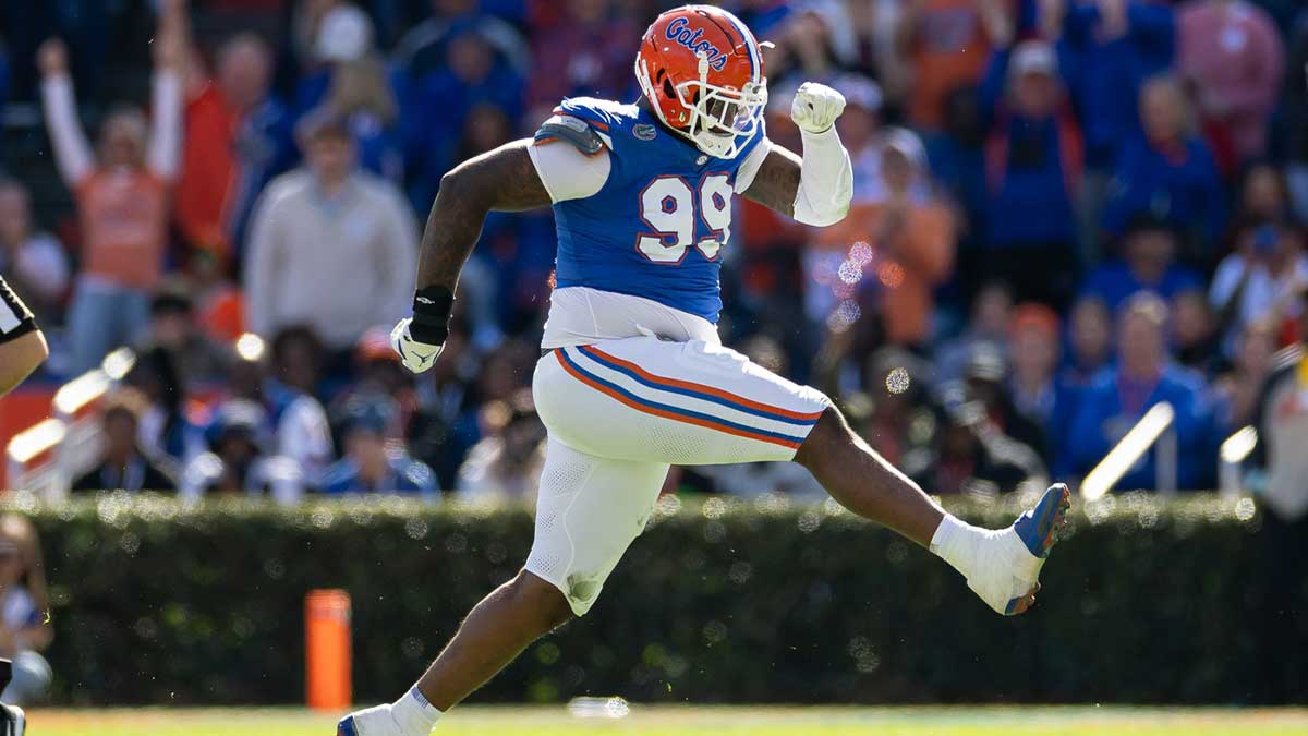 Florida Gators defensive lineman Cam Jackson (99) celebrates after a sack against the Mississippi Rebels during the first half at Ben Hill Griffin Stadium.