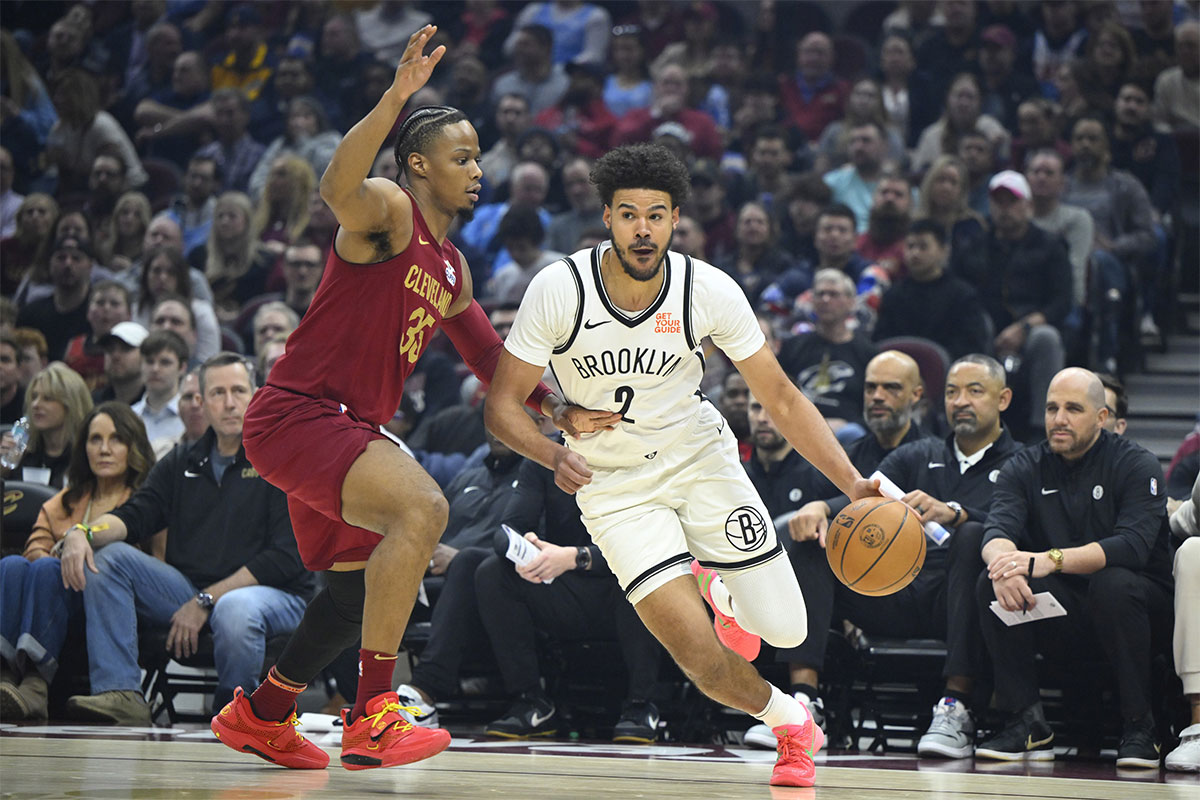 Cleveland Cavaliers forward Isaac Okoro (35) defends Brooklyn Nets forward Cameron Johnson (2) in the first quarter at Rocket Arena.