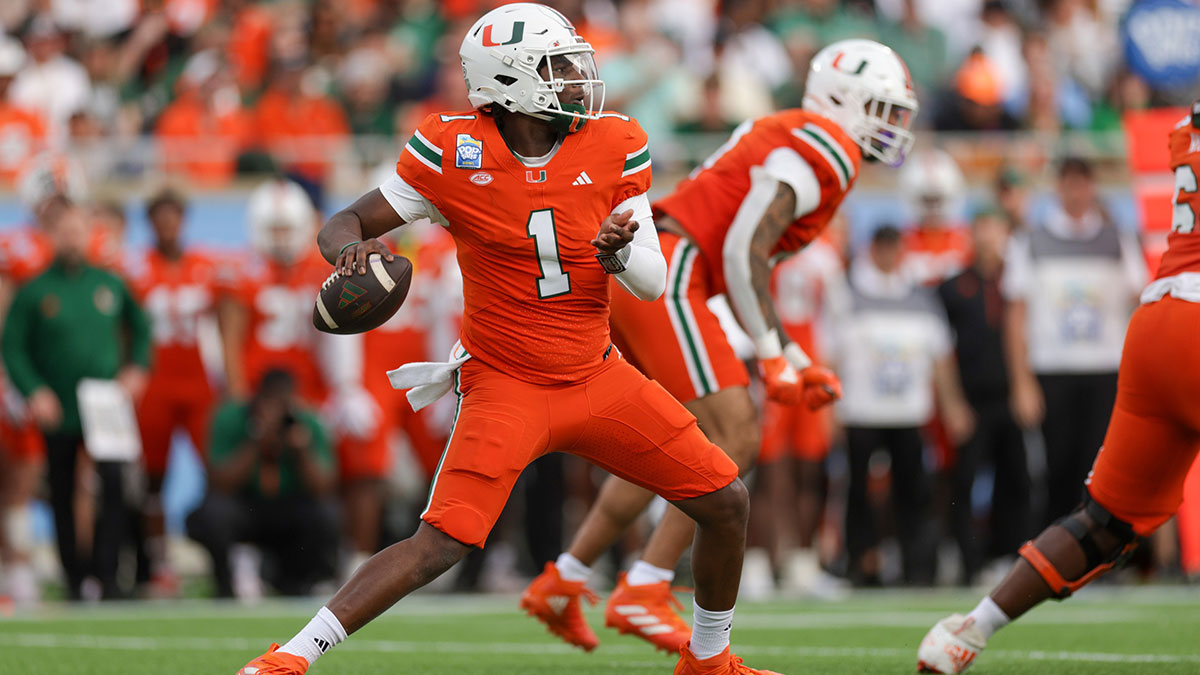 Miami Hurricanes quarterback Cam Ward (1) drops back to pass against the Iowa State Cyclones in the first quarter during the Pop Tarts bowl at Camping World Stadium