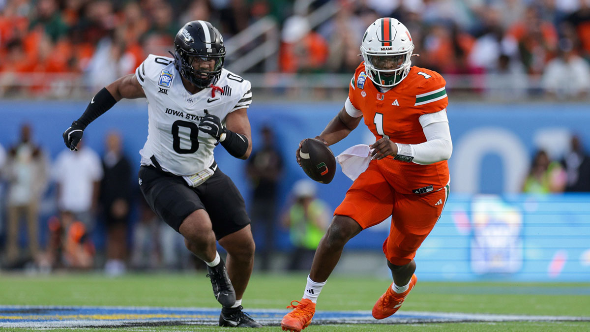 Miami Hurricanes quarterback Cam Ward (1) runs with the ball against the Iowa State Cyclones in the second quarter during the Pop Tarts bowl at Camping World Stadium. Mandatory Credit: Nathan Ray Seebeck-Imagn Images