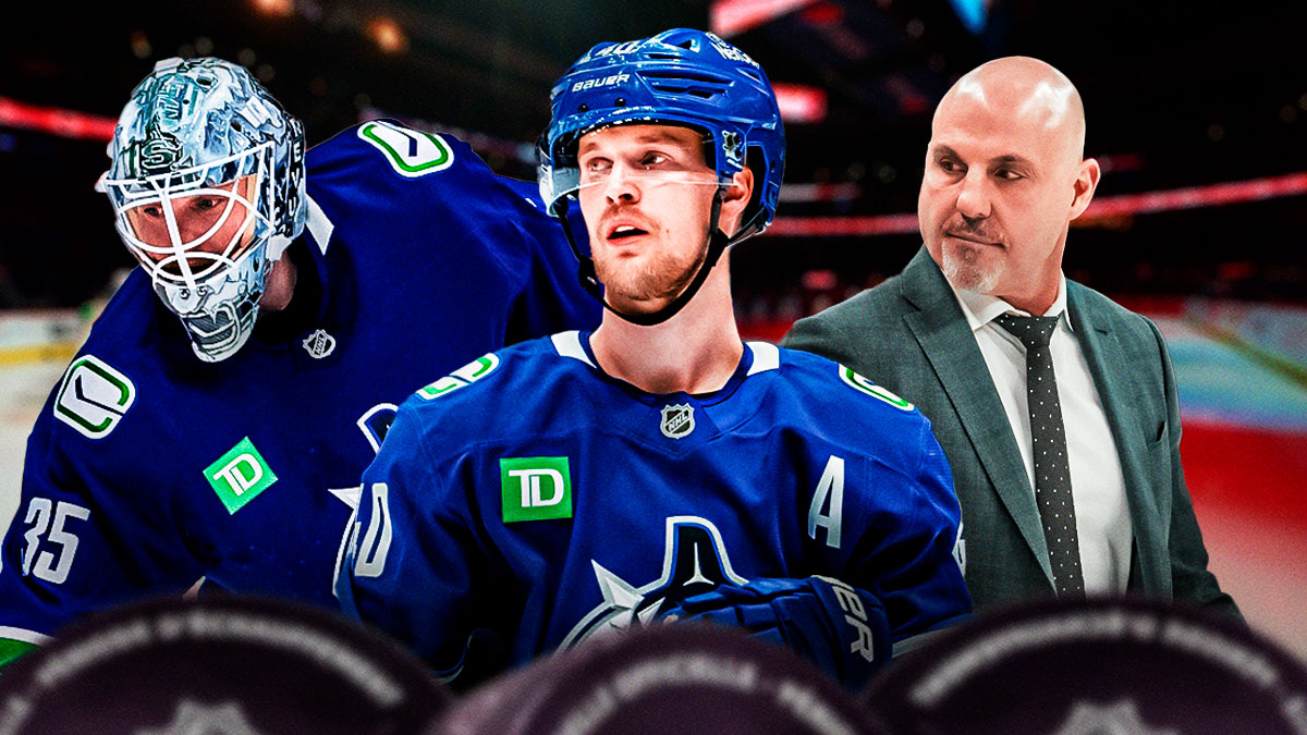 Elias Pettersson, front and center. Rick Tocchet behind to right. Thatcher Demko behind to left