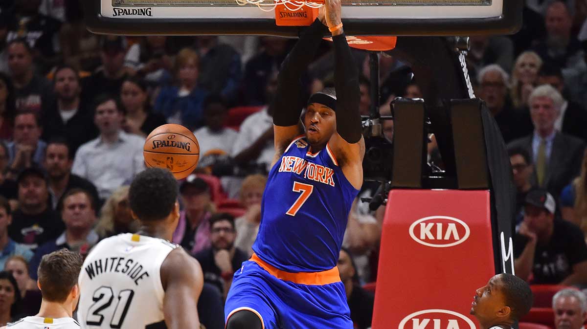 New York Knicks forward Carmelo Anthony (7) dunks the ball against the Miami Heat during the second half at American Airlines Arena. The New York Knicks defeat the Miami Heat 114-103.