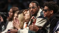 Former NBA forward Carmelo Anthony and his son Kyian Anthony during game two of the 2024 WNBA Semi-finals at Barclays Center.