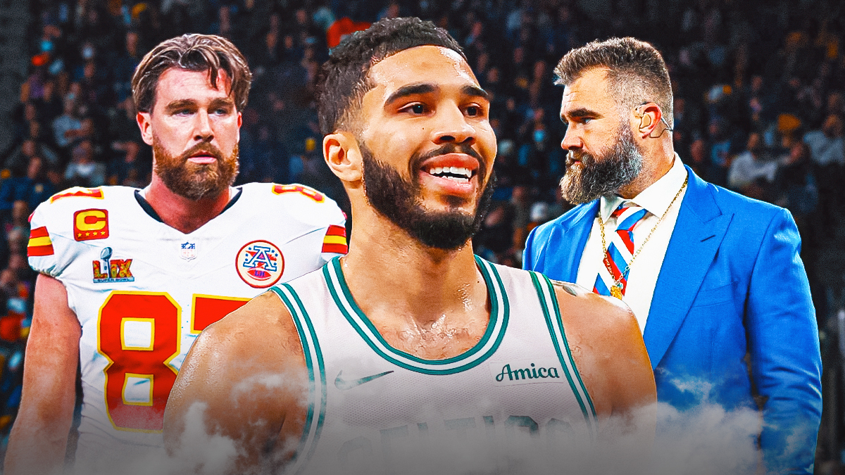 Celtics' Jayson Tatum smiling in between smiling Travis and Jason Kelce