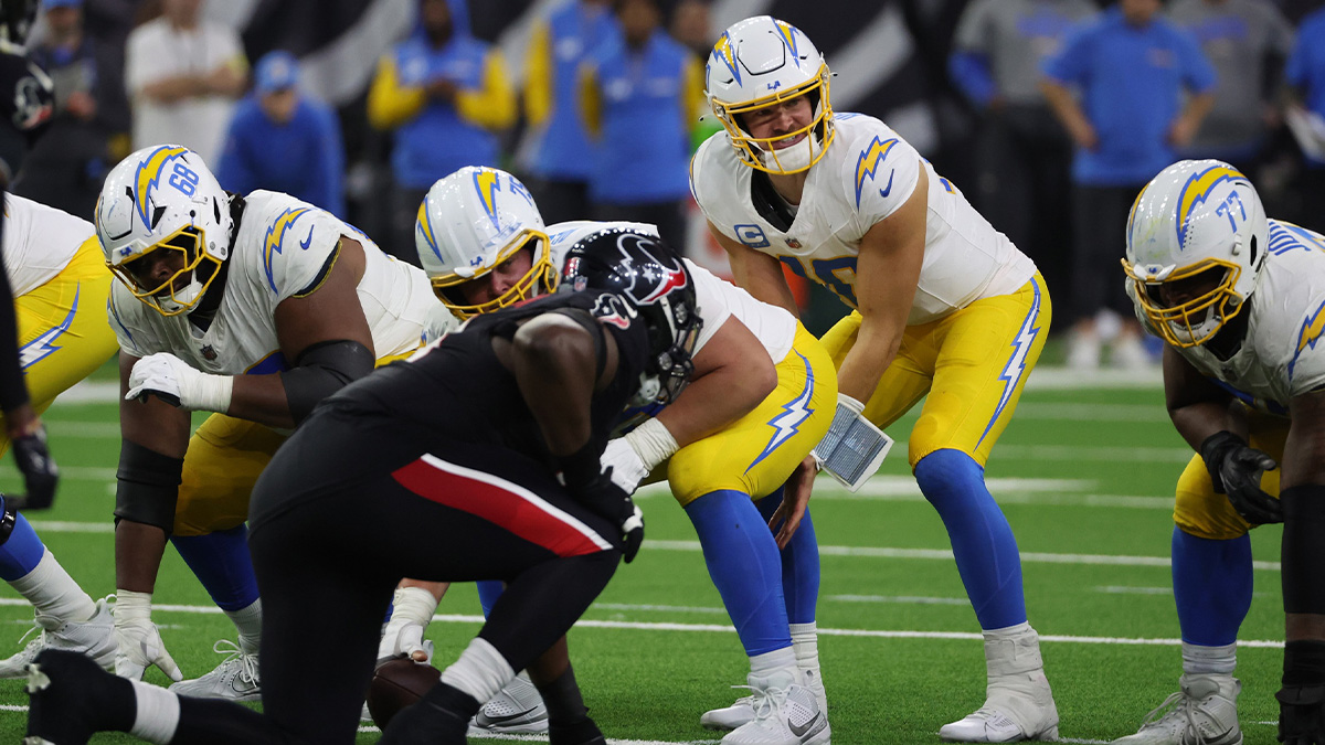 Los Angeles Chargers quarterback Justin Herbert (10) yells against the Houston Texans in the third quarter in an AFC wild card game at NRG Stadium. 