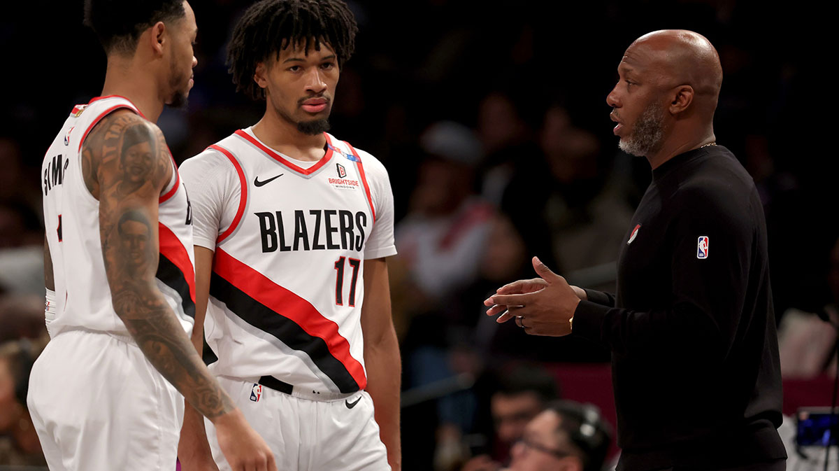 Portland Trail Blazers head coach Chauncey Billups talks to guards Anfernee Simons (1) and Shaedon Sharpe (17) during the first quarter against the Brooklyn Nets at Barclays Center.