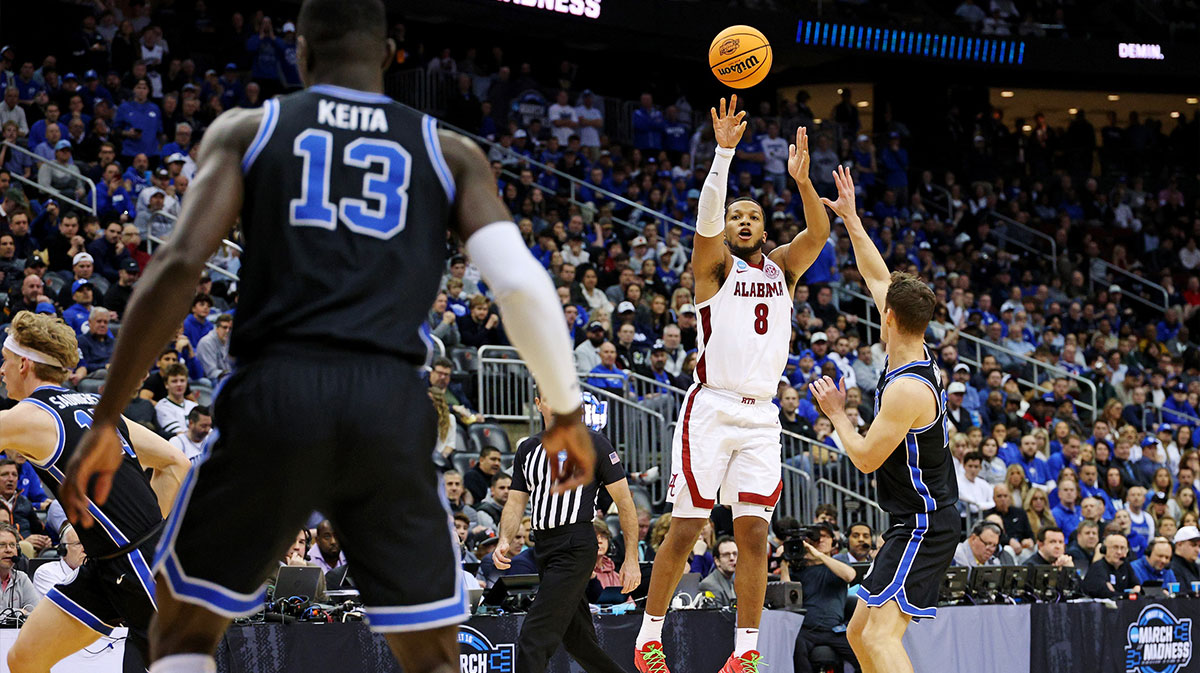 Alabama Crimson Tide men's basketball guard Chris Youngblood (8) shoots the ball against Brigham Young Cougars center Keba Keita (13) during the second half during an East Regional semifinal of the 2025 NCAA tournament at Prudential Center.