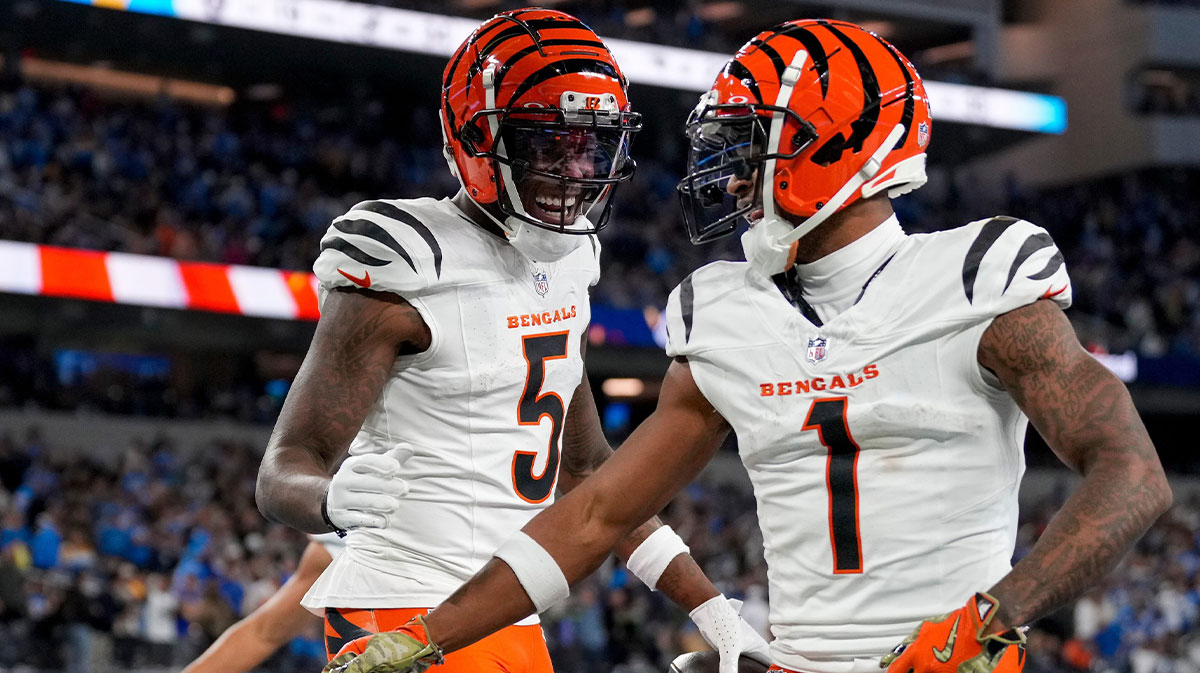 Cincinnati Bengals wide receivers Tee Higgins (5) and Ja'Marr Chase (1) celebrate a touchdown during a game on Nov. 17, 2024.