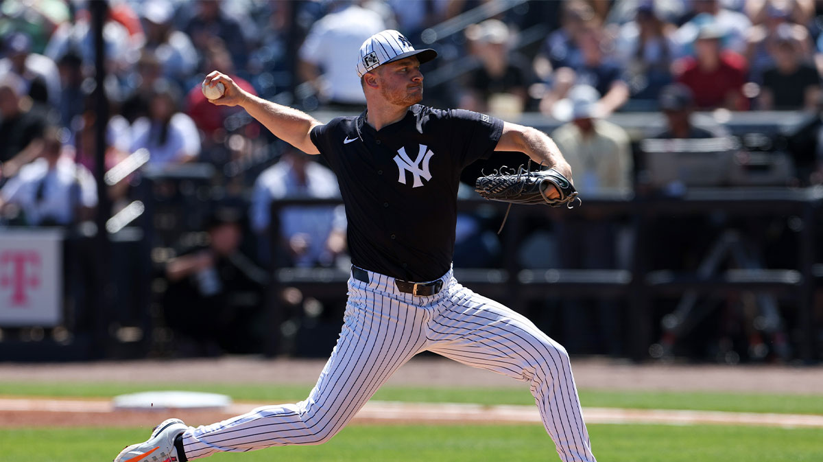 New York Yankees pitcher Clarke Schmidt (36) throws a pitch against the Baltimore Orioles in the first inning during spring training at George M. Steinbrenner Field.