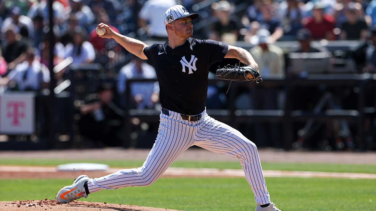 New York Yankees pitcher Clarke Schmidt (36) throws a pitch against the Baltimore Orioles in the first inning during spring training at George M. Steinbrenner Field. 