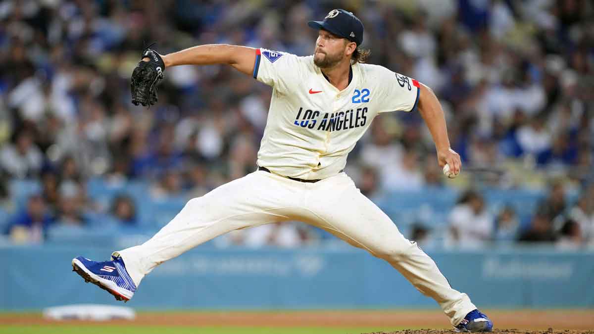 Aug 24, 2024; Los Angeles, California, USA; Los Angeles Dodgers starting pitcher Clayton Kershaw (22) throws against the Tampa Bay Rays at Dodger Stadium. 