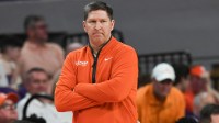 Clemson Head Coach Brad Brownell watches his team play Virginia Tech during the first half at Littlejohn Coliseum in Clemson, S.C Saturday, March 8, 2025.