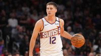 Phoenix Suns guard Collin Gillespie (12) dribbles against the Chicago Bulls during the second half at PHX Arena.