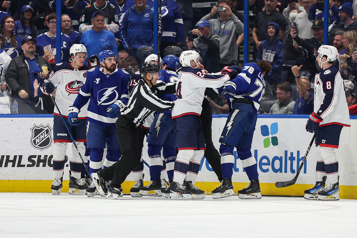 Columbus Blue Jackets Right Wing Mathieu Olivier (24) Tracks Tampa Bai Lightning Defenseman Emil Lilleberg (78) In the second period in Amalie Arena.