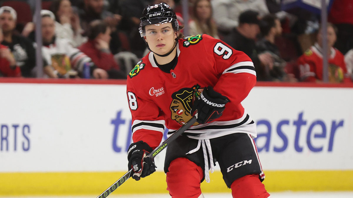 Chicago Blackhawks center Connor Bedard (98) skates with the puck against Los Angeles Kings during the third period at United Center.