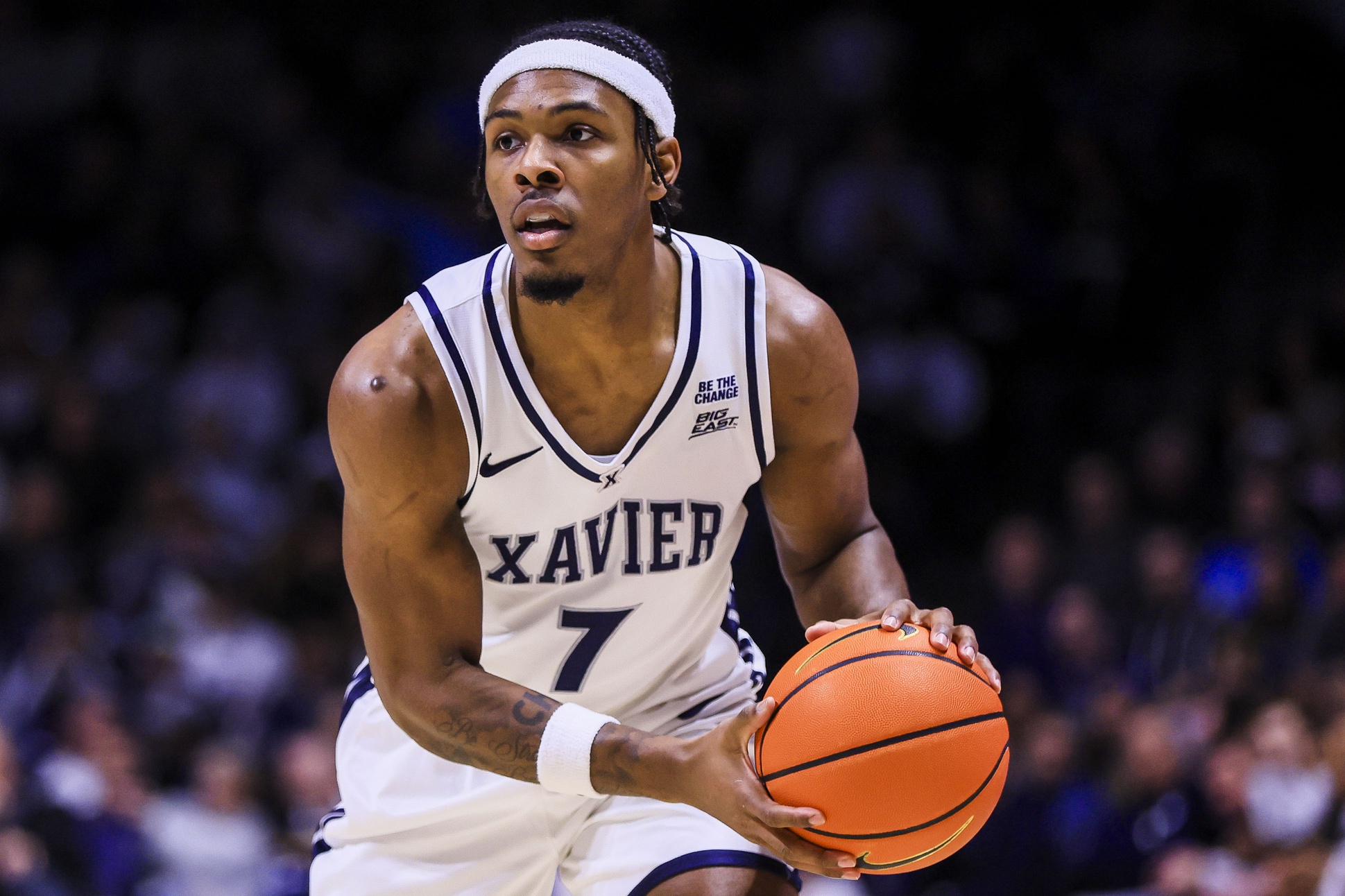 Xavier Musketeers guard Ryan Conwell (7) hold the ball against the Providence Friars and Michigan State in the first half at Cintas Center with Tom Izzo.