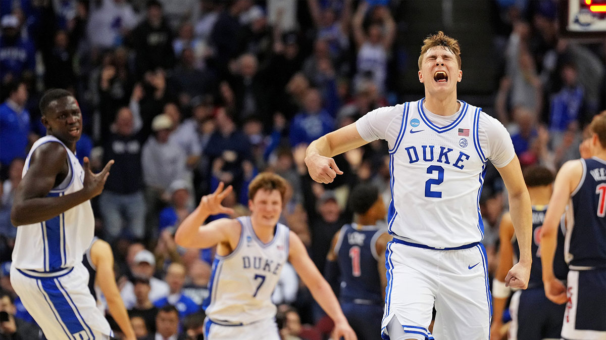 Duke Blue Devils forward Cooper Flagg (2) reacts after making a last second shot to end the first half against the Arizona Wildcats during an East Regional semifinal of the 2025 NCAA tournament at Prudential Center.