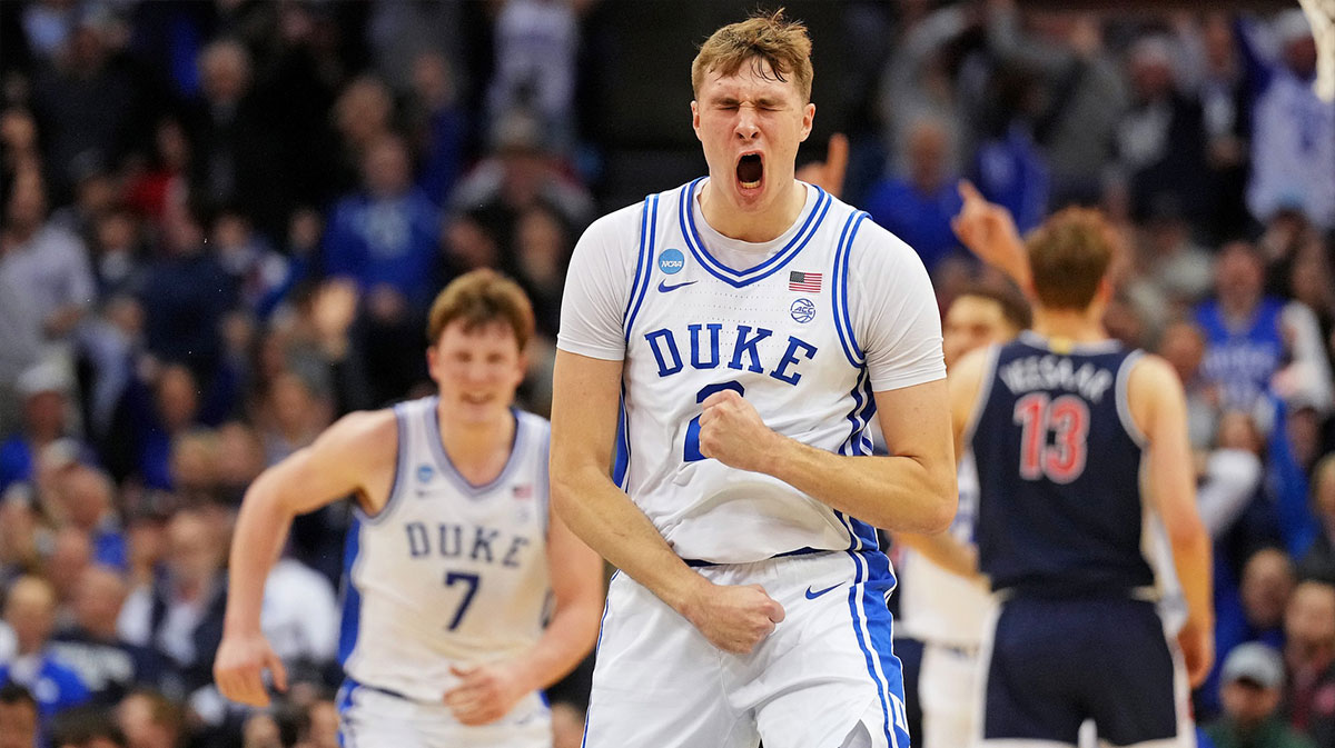 Duke Blue Devils forward Cooper Flagg (2) reacts after making a last second shot to end the first half against the Arizona Wildcats during an East Regional semifinal of the 2025 NCAA tournament at Prudential Center.