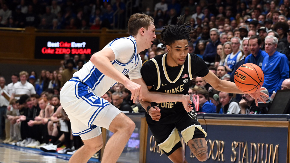 Wake Forest Demon Deacons guard Hunter Sallis (23) drives to the basket as Duke Blue Devils forward Cooper Flagg (2) defends during the first half at Cameron Indoor Stadium. Mandatory Credit: Rob Kinnan-Imagn Images
