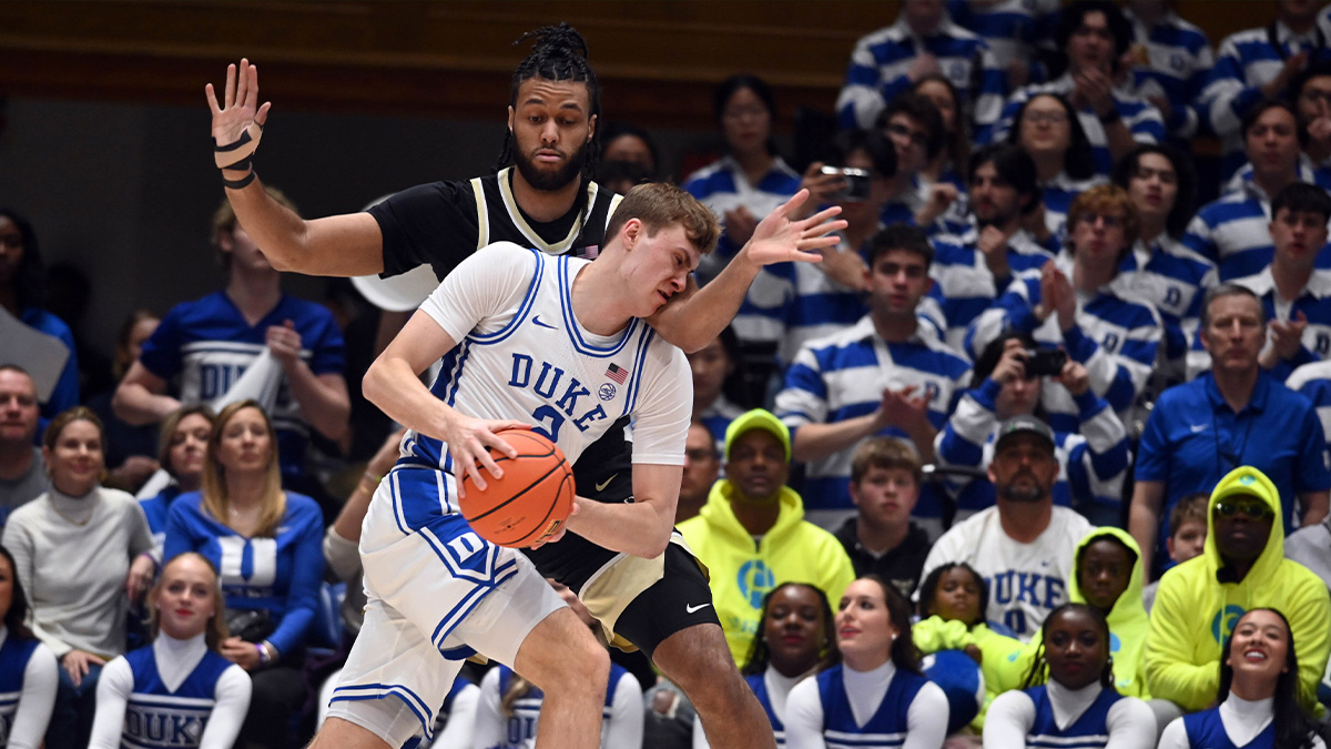 Duke Blue Devils Forward Cooper Cooperg (2) Drive to Cart as Wake Forest Demon Deacons Center Efton Reid III (4) Ends during the first half in the Cameron Indoor Stadium stadium. Mandatory Credit: Rob Kinnan-IMMN Pictures