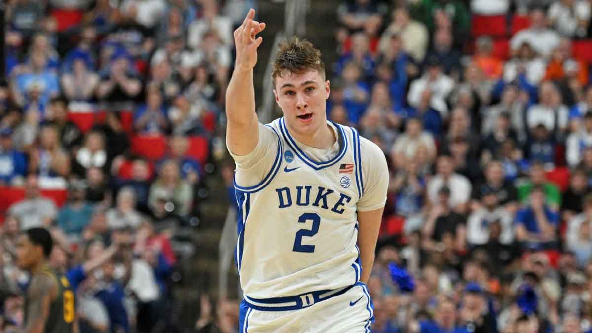 Duke Blue Devils forward Cooper Flagg (2) reacts after scoring a 3 pointer during the first half against the Baylor Bears in the second round of the NCAA Tournament at Lenovo Center.